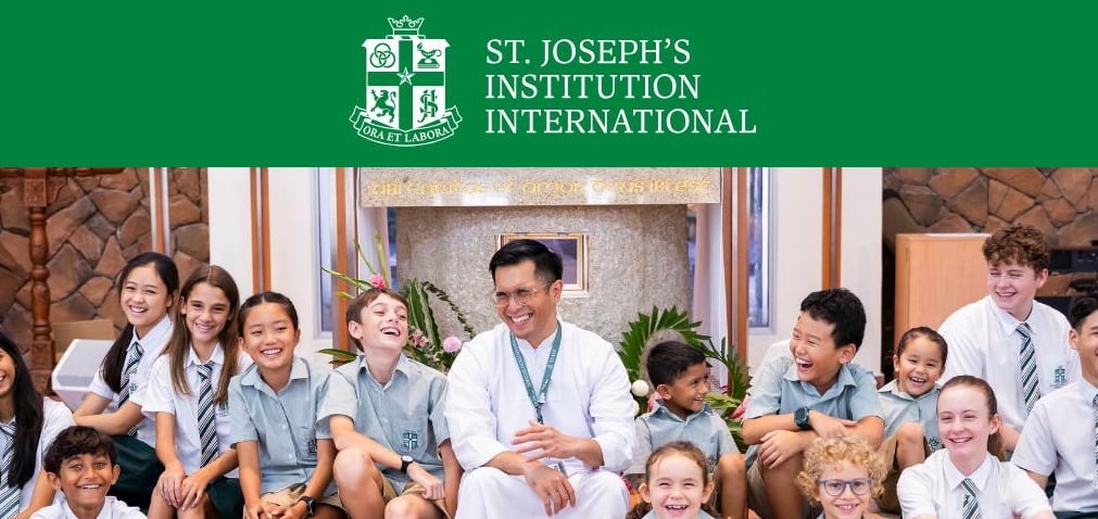 a man in a white coat and tie dye on a white shirt