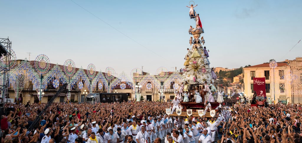 a crowd of people standing around a float of a float