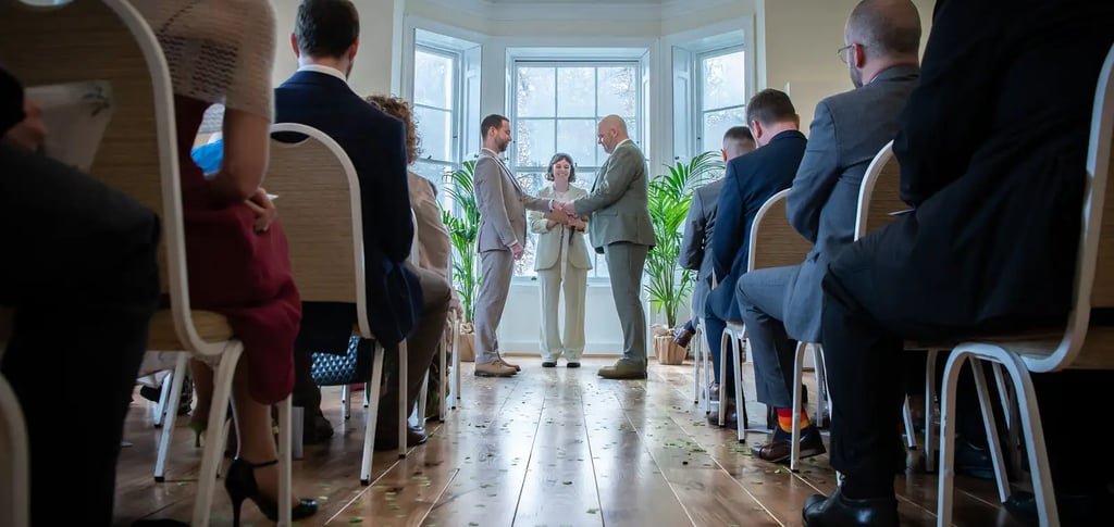 two grooms being married at their ceremony in Pembroke Lodge Richmond