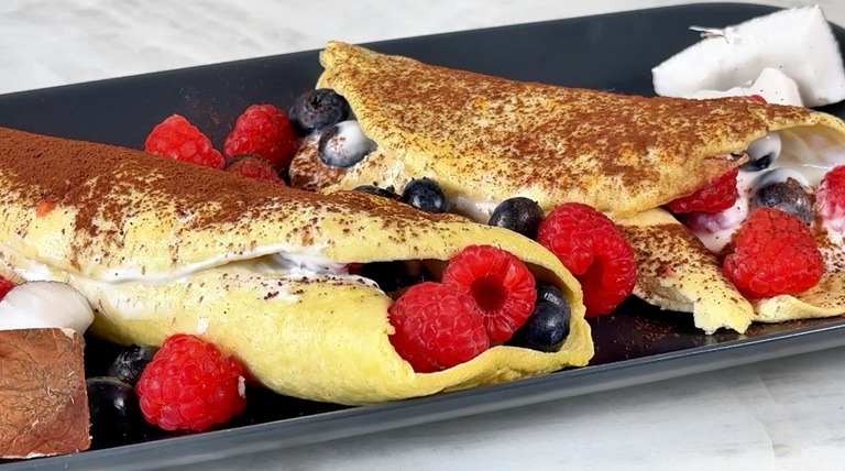 Light coconut crêpes made with coconut flour and almond milk — healthy, dairy-free breakfast.