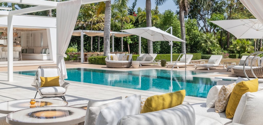 Poolside lounge area with shaded pergola