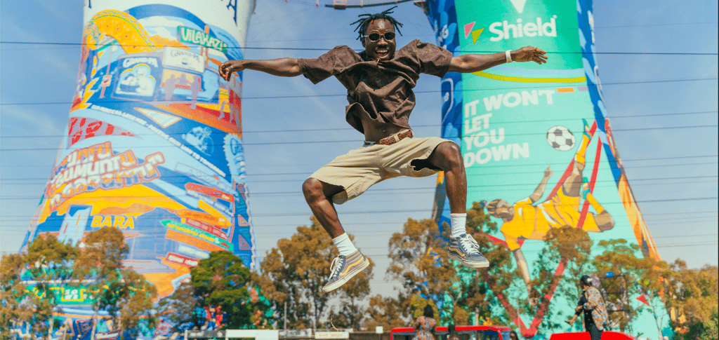 Kofi Dotse jumping into the sky at Soweto Towers