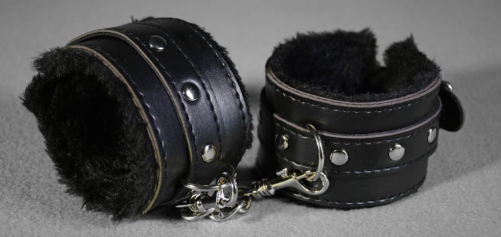 black lined cuffs for bdsm play