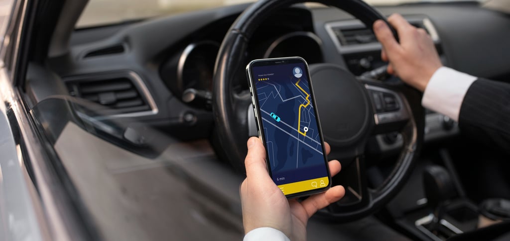 Aplikasi navigasi e-taxi membantu pengemudi mengikuti rute.