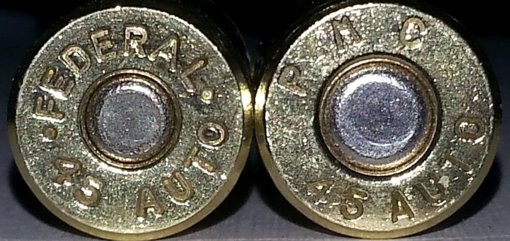 two federal brand .45 ammo casings