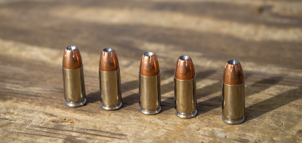 9mm ammo on a table displayed