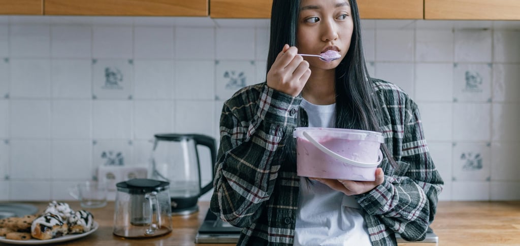 Photo by Alena Darmel: https://www.pexels.com/photo/sad-woman-eating-ice-cream-6643006/