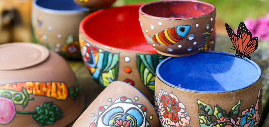 Vibrant colorful illustrated pottery