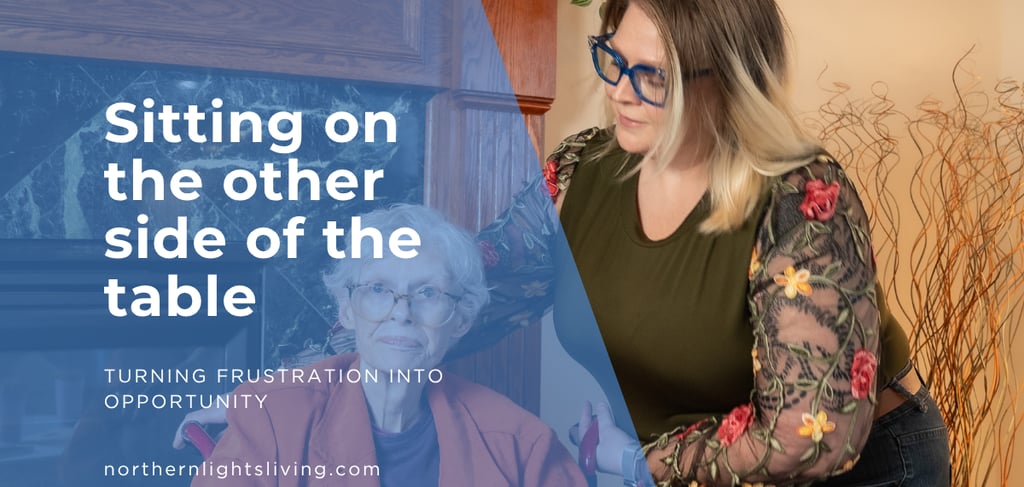 A female caregiver assisting an elderly woman in a wheelchair for senior care support.