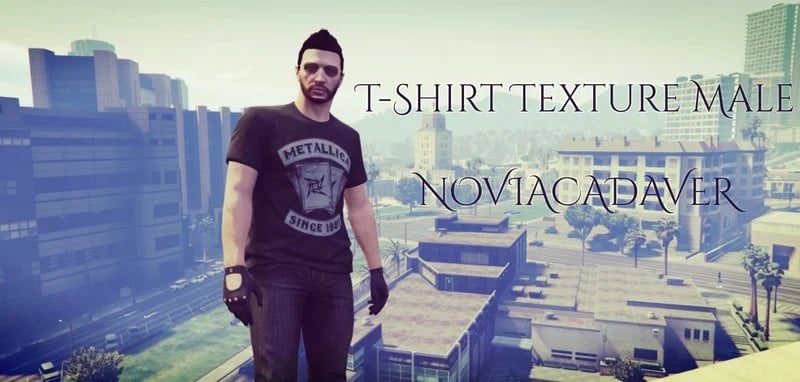 a man in a t - shirt and gloves standing on a ledge