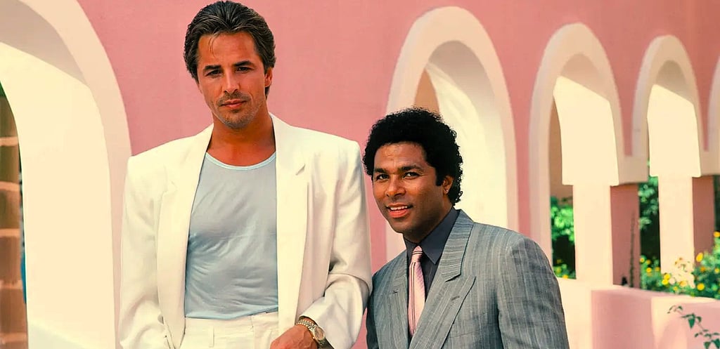 Stylized image of Sonny and Tubbs from Miami Vice posing in front of a pastel-colored background