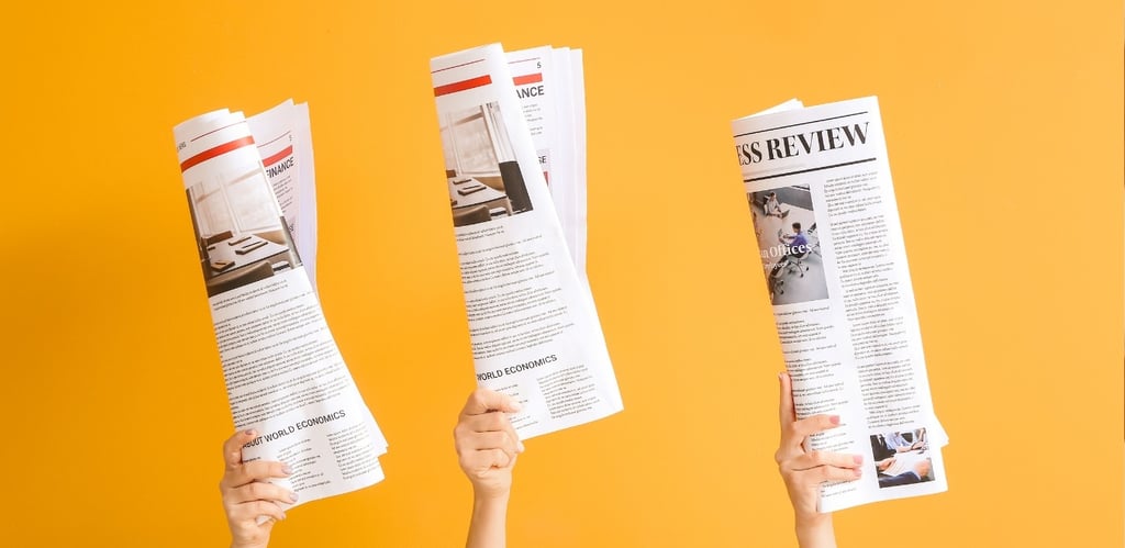 three hands holding up newspapers and a newspaper-digital marketing institution