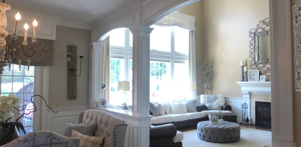 Custom architectural archway with columns and wall paneling in Monmouth County NJ