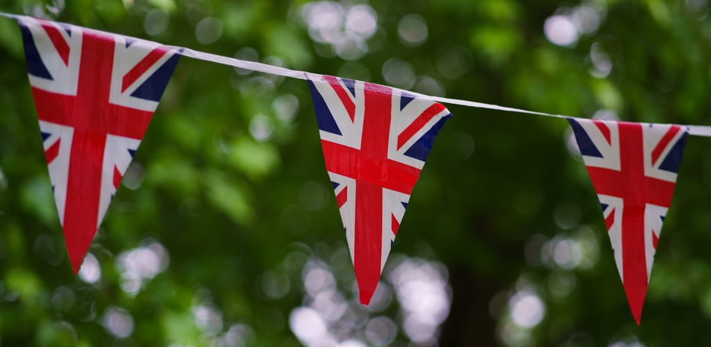 Row of triangular British flags, symbolizing international students' journey in the UK