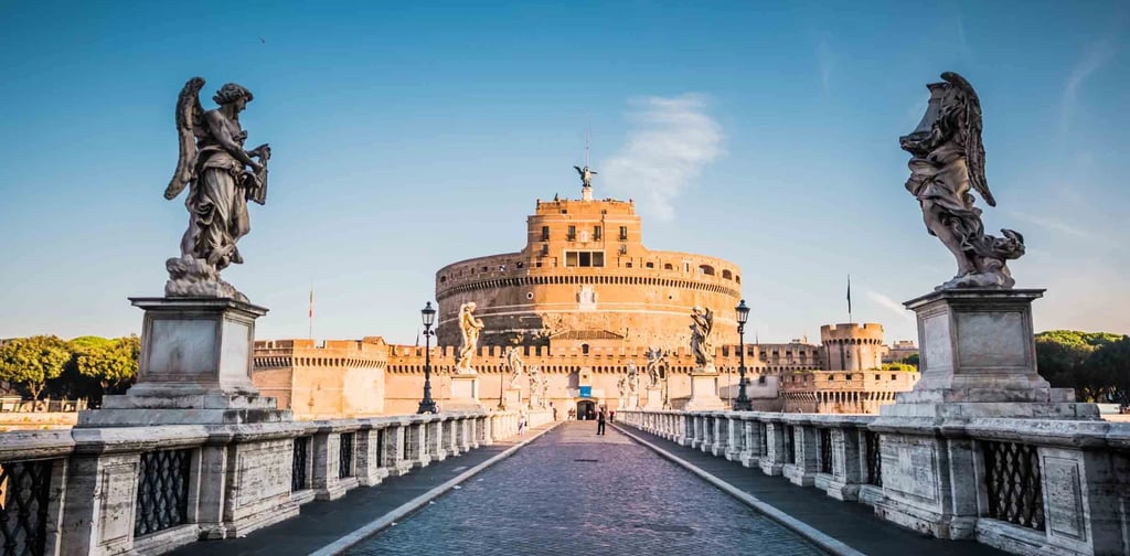 Castel Sant'Angelo and the Ponte Sant'Angelo bridge with angel statues in Rome, Italy.