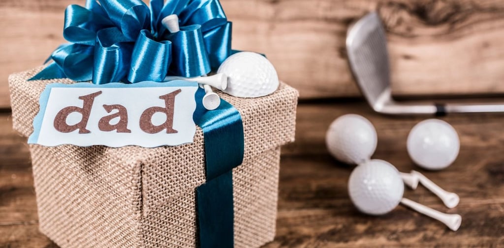 a gift box with a golf ball