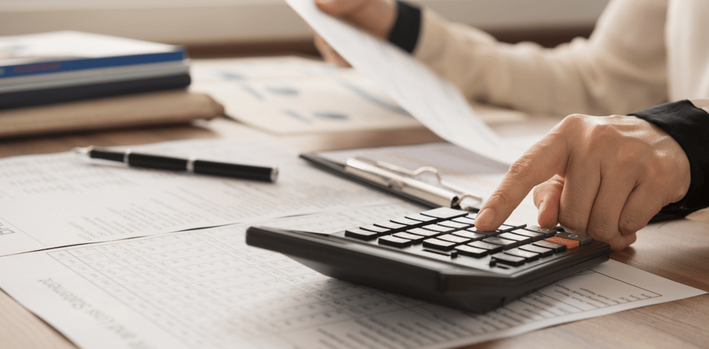 accountant hand calculation on calculator