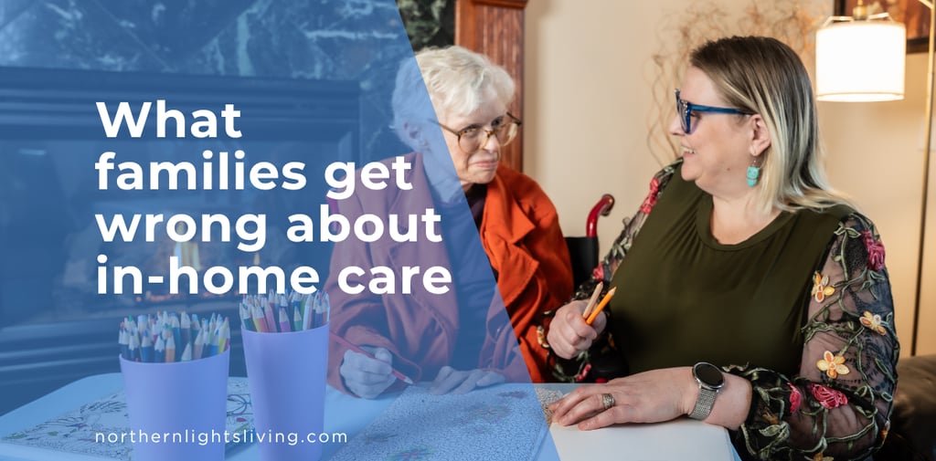 A senior woman and a professional caregiver coloring together during an in-home care session.