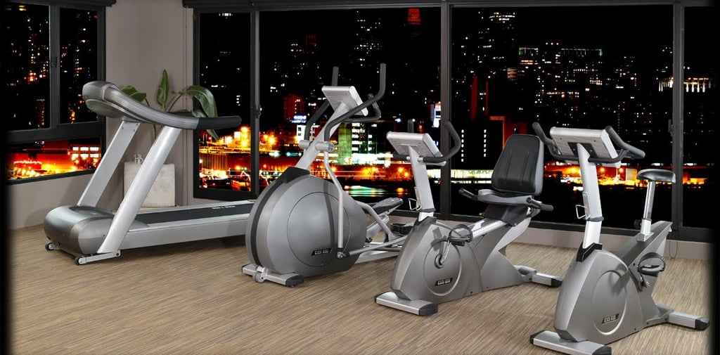 Room full of exercise equipment for home workout