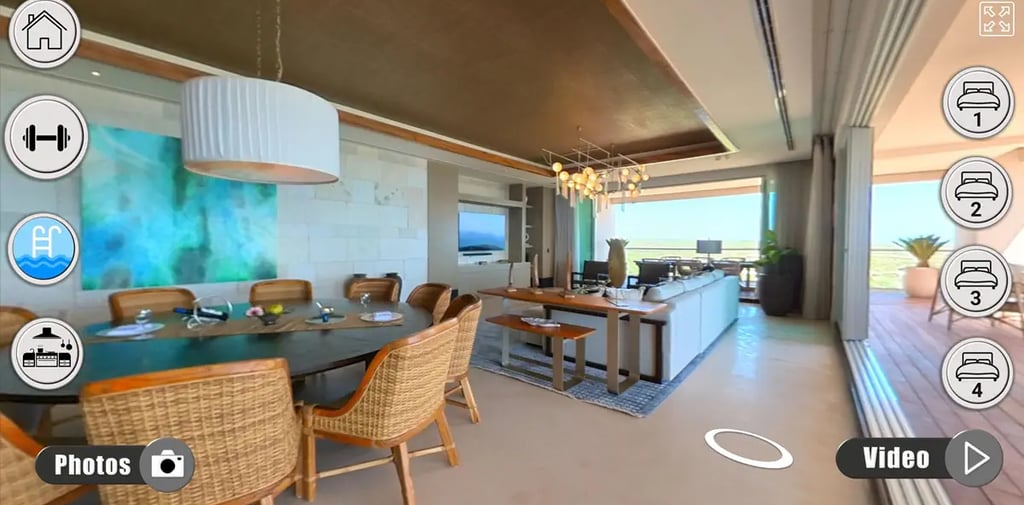 a living room with a dining room and a dining room