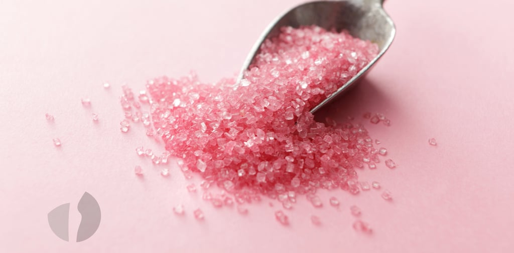 Cristais de adocante rosa