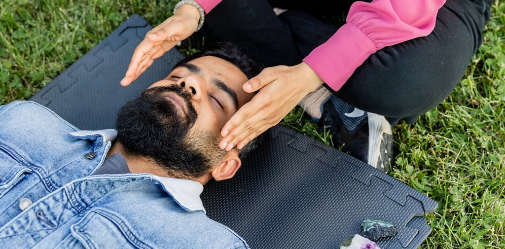 a woman doing a reiki session in the park