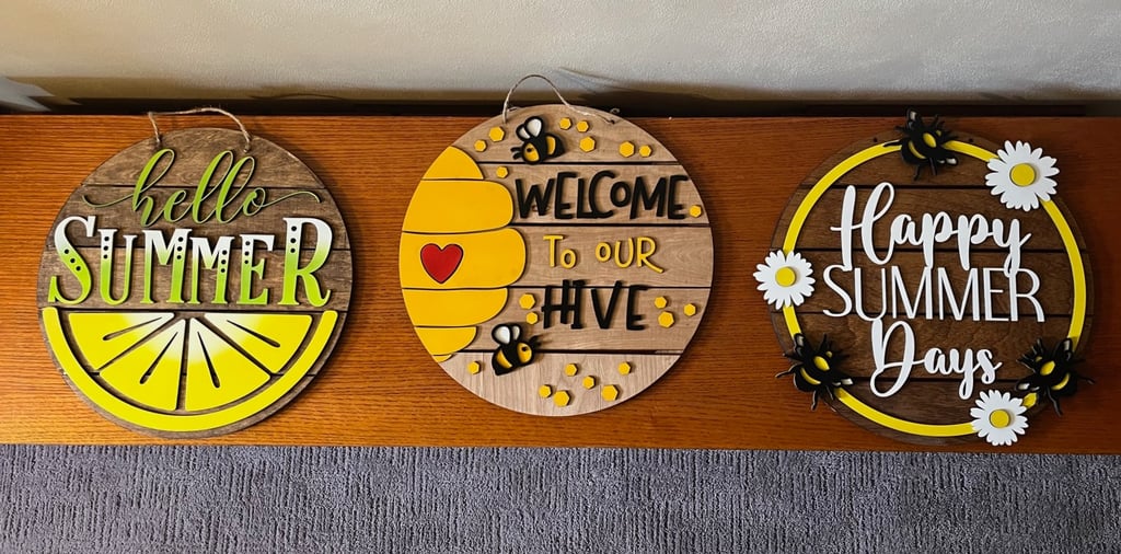 laser cut and colorfully painted wooden door or wall hangers