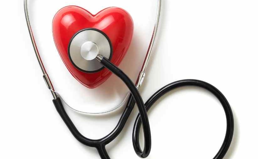 Stethoscope on a red toy heart