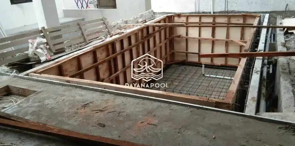 proses pemasangan bata untuk begisting kolam renang