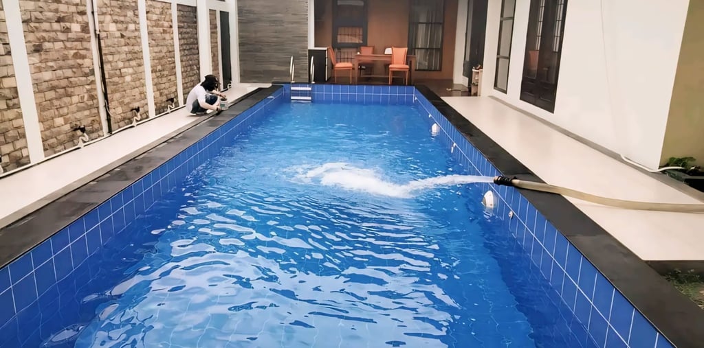 pengisian air kolam renang