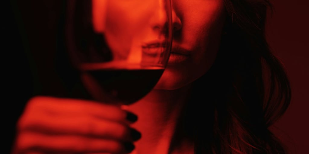 Woman with glass of wine