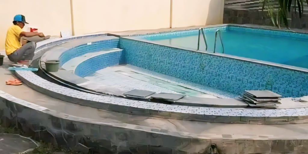 finising batu alam andesit kolam renang.