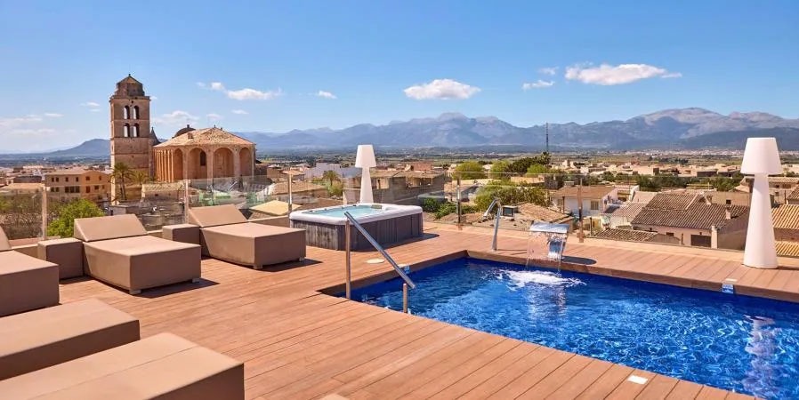 Rooftop Swimming Pool with Sun Loungers at Can Ribera by Zafiro