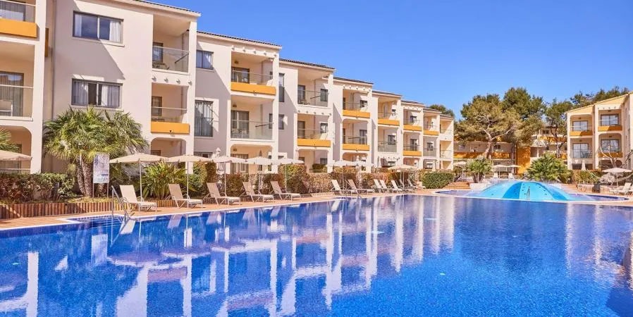 Blue Sky and Swimming Pool at Zafiro Tropic