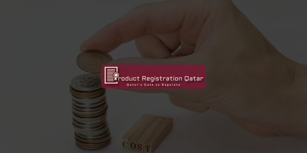 Hand stacking coins beside wooden blocks labeled COST—symbolizing product registration cost in Qatar.