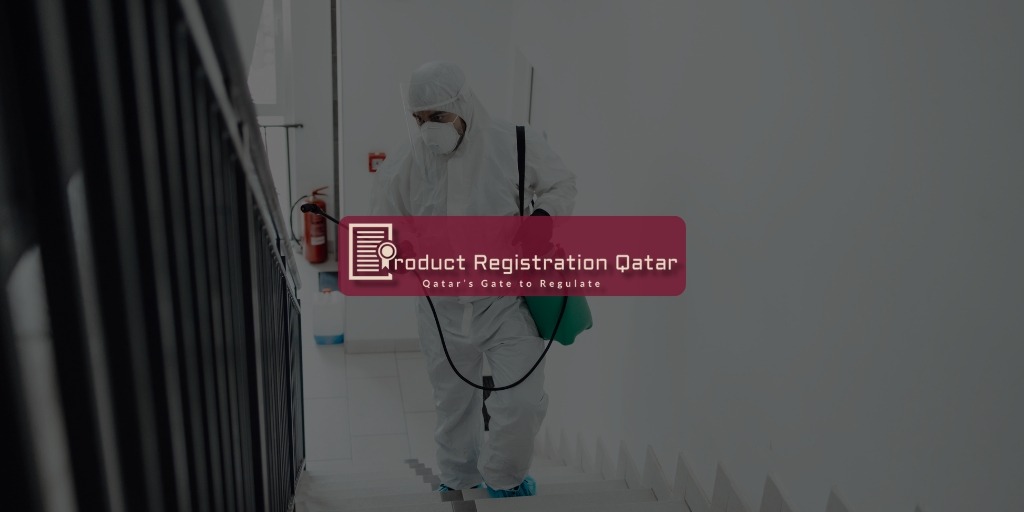 Worker in full protective gear spraying disinfectant in building stairwell, representing cleaning product regulation in Qatar
