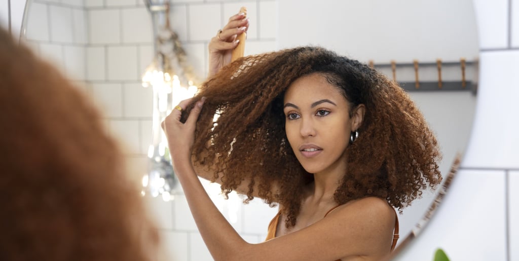 taking care with curly hair with hair tonic