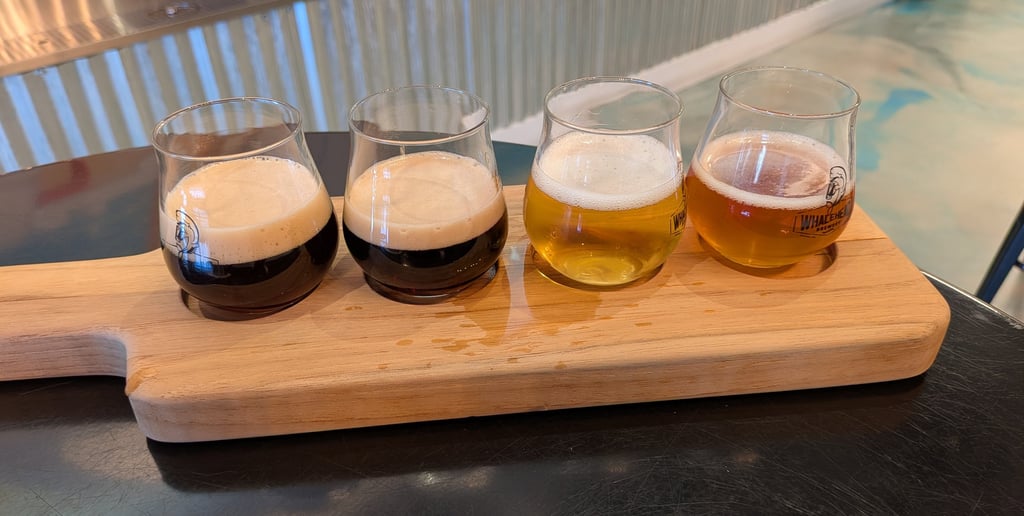 a wooden flight holder with glasses of beer