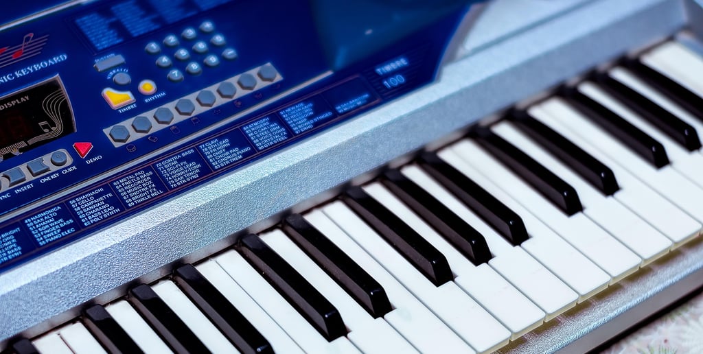 Detail view of an electronic music synthesizer keys and knobs.