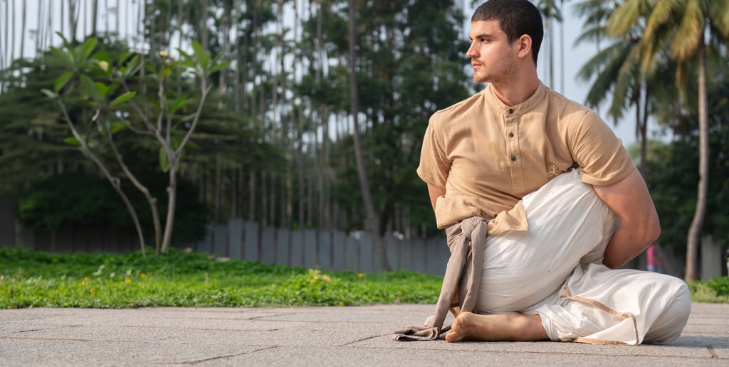 a man doing posture of hatha yoga