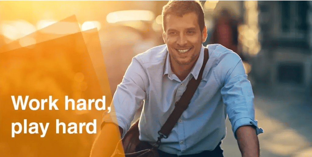 man biking, text 'work hard, play hard'