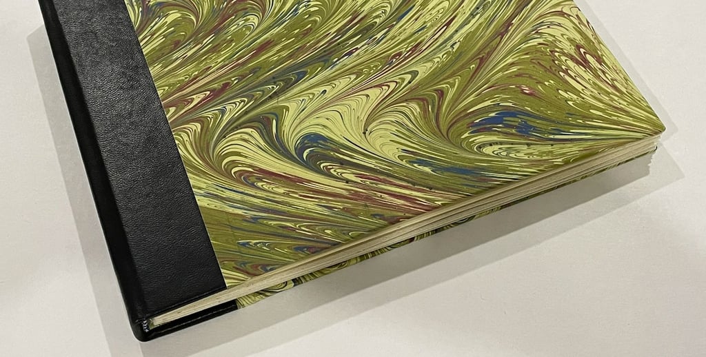 Album with marbled paper and decorative pages