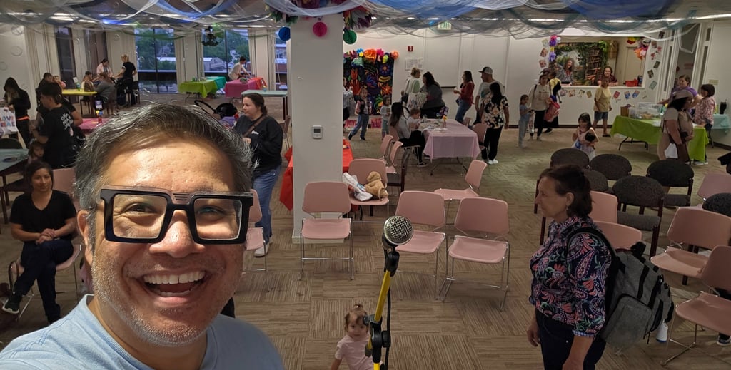 Tío Tóto setting up for an interactive kids music show at Temple Public Library for Día de los Libro