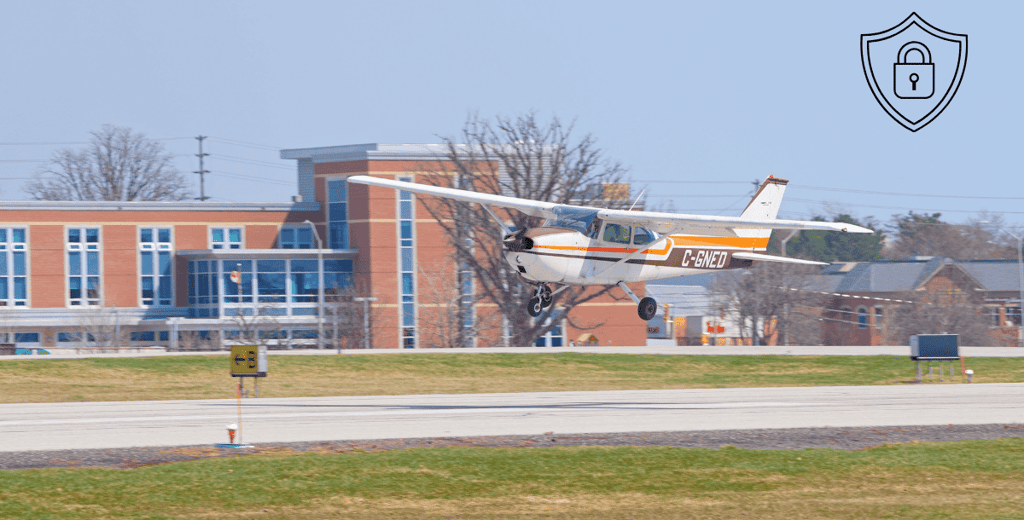 a small plane taking off from a runway