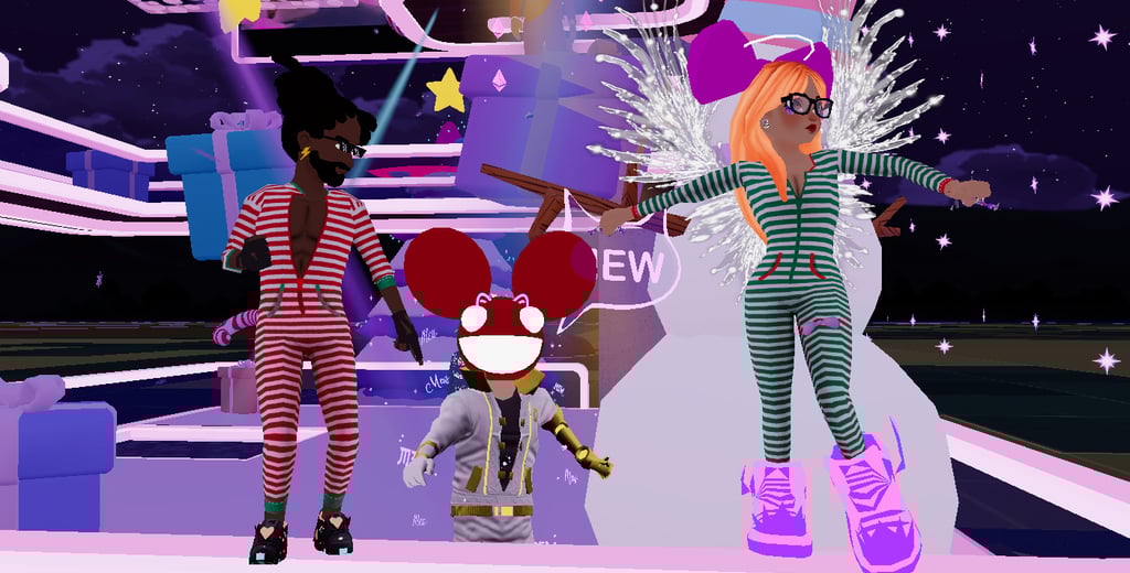 a group of people standing around a stage