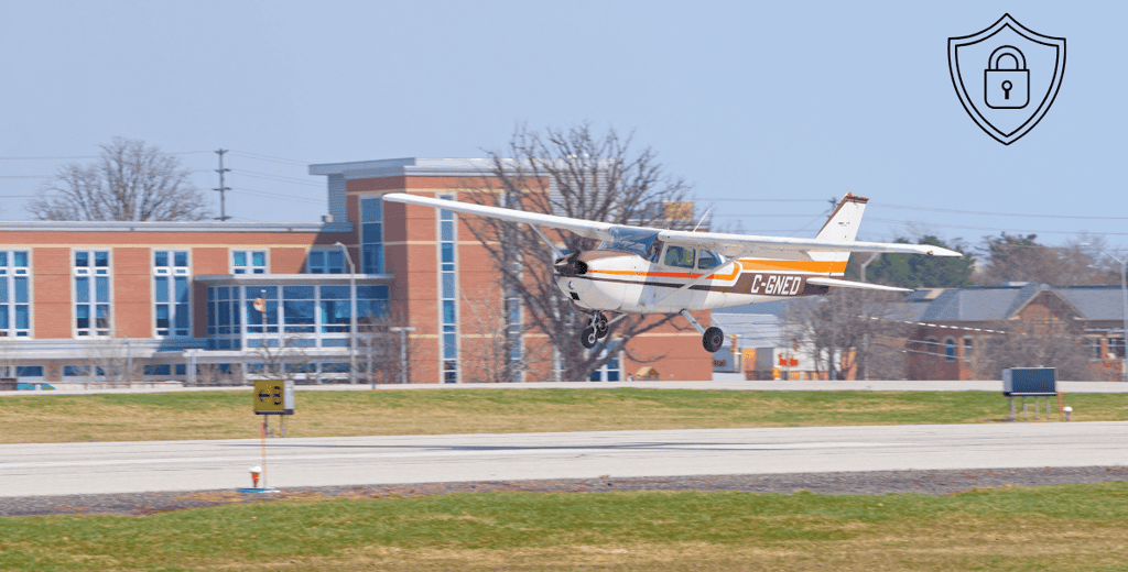 a small plane taking off from a runway