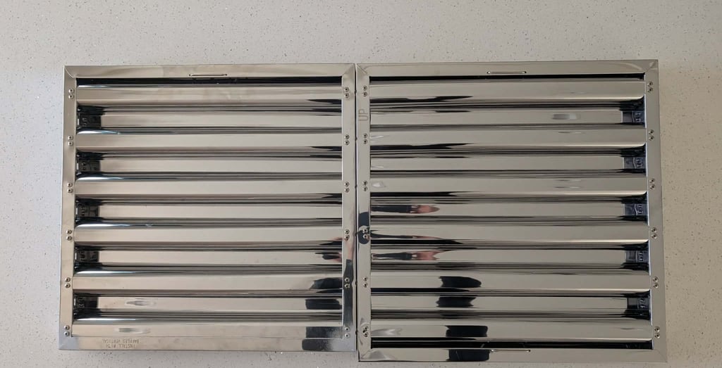 Pictured are Correct Clean commercial range hood filters available in custom sizes. 