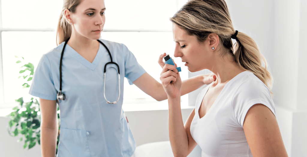 Asthma Woman with doctor at the hospital