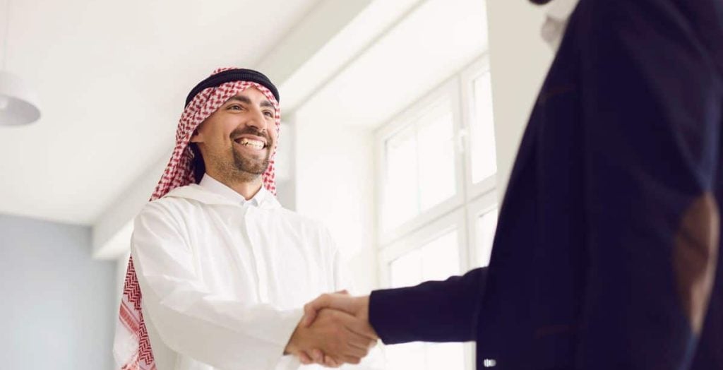 Saudi man handshake