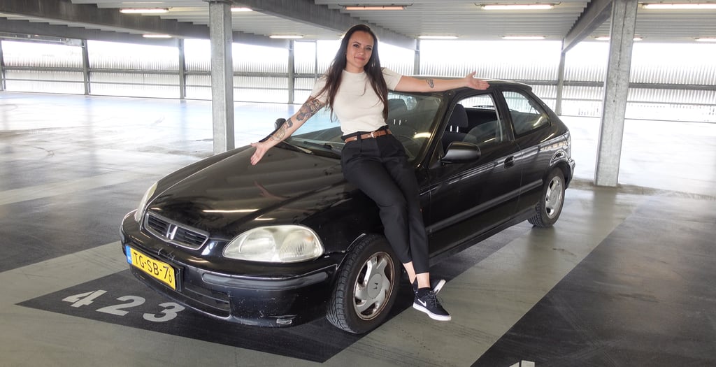 Joy van Haelen and her black Honda Civic